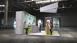 20x20 Isla booth design by Reaction Space